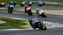 Di lap-lap awal, pembalap Spanyol, Jorge Lorenzo (Movistar Yamaha MotoGP- depan) sempat memimpin lomba yang berlangsung di Sirkuit Mugello, Italia, (1/6/2014). (AFP PHOTO/Filippo Monteforte)
