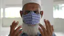 Seorang Muslim mengenakan penutup wajah saat berdoa di Masjid Jummah selama bulan suci Islam Ramadhan di Kolombo, Sri Lanka pada 4 Mei 2020. Umat Islam di dunia menjalankan ibadah Ramadan di tengah pandemi virus corona dan penerapan lockdown. (ISHARA S. KODIKARA / AFP)