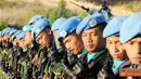 Para prajurit Konga, khususnya yang bertugas di markas besar UNIFIL Kampung Naqoura, Lebanon Selatan, menerima perintah harian dalam upacara militer Peringatan ke-66 Hari Ulang Tahun TNI, Rabu (5/10).