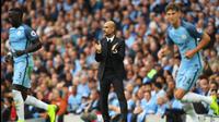 Pep Guardiola membawa Manchester City meraih kemenangan 2-1 melawan Sunderland pada laga pembuka Premier League 2016-2017, Sabtu (13/8/2016). (AFP)