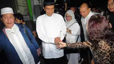 Setelah merampungkan berbagai agenda kampanye, Capres Jokowi pergi menunaikan umrah, Minggu (07/07/14) (Liputan6.com/Faizal Fanani)
