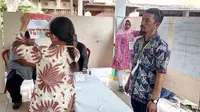 Penghitungan suara Pilkada Kota Malang di TPS 19 Oro - Oro Dowo, Kota Malang. (Liputan6.com/Zainul Arifin)