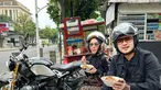 Pasangan Shandy Purnamasari dan Gilang Juragan 99 terlihat santai saat makan bubur ayam kaki lima dengan outfit hitam. Di kepalanya masih menempel helm dan berkaca mata. (FOTO: instagram.com/shandypurnamasari/)