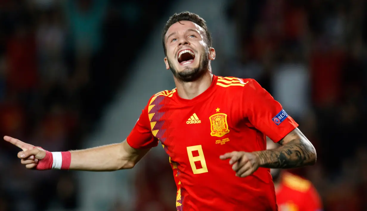 Pemain Spanyol,  Saul Niguez berselebrasi usai mencetak gol pertama ke gawang Kroasia selama pertandingan UEFA Nations League di stadion Manuel Martinez Valero, Spanyol (11/9). Spanyol menang telak atas Kroasia 6-0. (AP Photo/Alberto Saiz)
