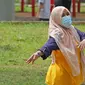 Aktivitas pagi hari pasien berstatus OTG (Orang Tanpa Gejala) di RSDC Wisma Atlet, Jakarta, Selasa (26/1/2021). Data Satgas Covid-19 per Selasa (26/1) mencatat kasus COVID-19 di Indonesia bertambah 13.094 sehingga total menyentuh angka satu juta, tepatnya 1.012.350. (Liputan6.com/Herman Zakharia)