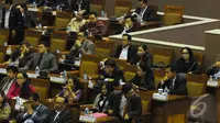 Suasana rapat paripurna penetapan jumlah komisi DPR. Beberapa bangku tampak kosong, Jakarta, Kamis (16/10/2014) (Liputan6.com/Andrian M Tunay)