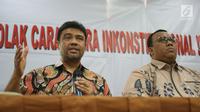 Presiden KSPI Said Iqbal (kiri) dan Presiden KSPSI Andi Gani Nena Wea saat konferensi pers, Jakarta, Rabu (25/9/2019). Kendati menilai revisi UU No 13/2003 tentang Ketenagakerjaan merugikan buruh, serikat pekerja meminta buruh menahan diri dan mengedepankan keutuhan NKRI. (Liputan6.com/Angga Yuniar)