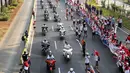 Belasan motor Harley Davidson memeriahkan prosesi Torch Relay Asian Games 2018 di Jalan Jendral Sudirman, Jakarta, Sabtu (18/8). Hari terakhir kirab obor ini api abadi dibawa dari Tugu Monas hingga Gelora Bung Karno. (Liputan6.com/ Fery Pradolo)