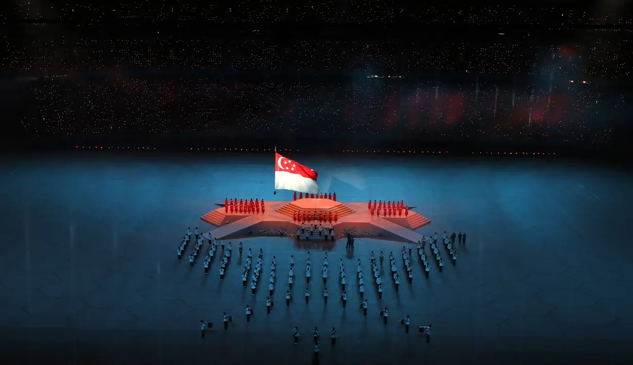 Ribuan orang memadati National Stadium saat menyaksikan pembukaan SEA Games 2015, Singapura, Jumat (5/6/2015). (Reuters)