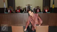 Suryadharma Ali (SDA) saat menjalani sidang vonis di Pengadilan Tipikor, Jakarta, senin (11/1/2016). SDA divonis 6 tahun penjara dan denda Rp.300 juta subsider 3 bulan kurungan dan membayar uang pengganti sebesar Rp.1,8 M. (Liputan6.com/Helmi Afandi)