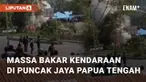 Massa bakar kendaraan di Mulia, Papua Tengah, usai 3 warga tewas diduga tertembak. Kendaraan yang dibakar termasuk milik Polres, Dandim, Danyon, Forkopimda,