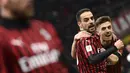 Gelandang AC Milan, Giacomo Bonaventura, merayakan gol yang dicetaknya ke gawang Torino pada laga Coppa Italia di Stadion San Siro, Milan, Selasa (28/1). Milan menang 4-2 atas Torino. (AFP/Miguel Medina)