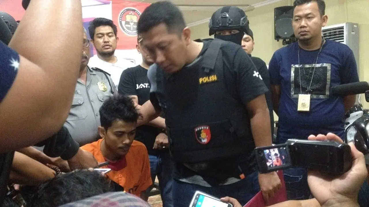 Zulkifli, anggota komplotan pembunuh sadis satu keluarga di Makassar akhir tertangkap (Liputan6.com/ Eka Hakim)