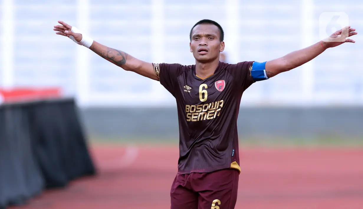 Pemain depan PSM Makassar, Ferdinand Sinaga merayakan gol yang dicetaknya ke gawang Shan United FC pada laga lanjutan Grup H Piala AFC 2020 di Stadion Madya Gelora Bung Karno, Jakarta, Rabu (26/2/2020). PSM Makassar unggul 3-1. (Liputan6.com/Helmi Fithriansyah)