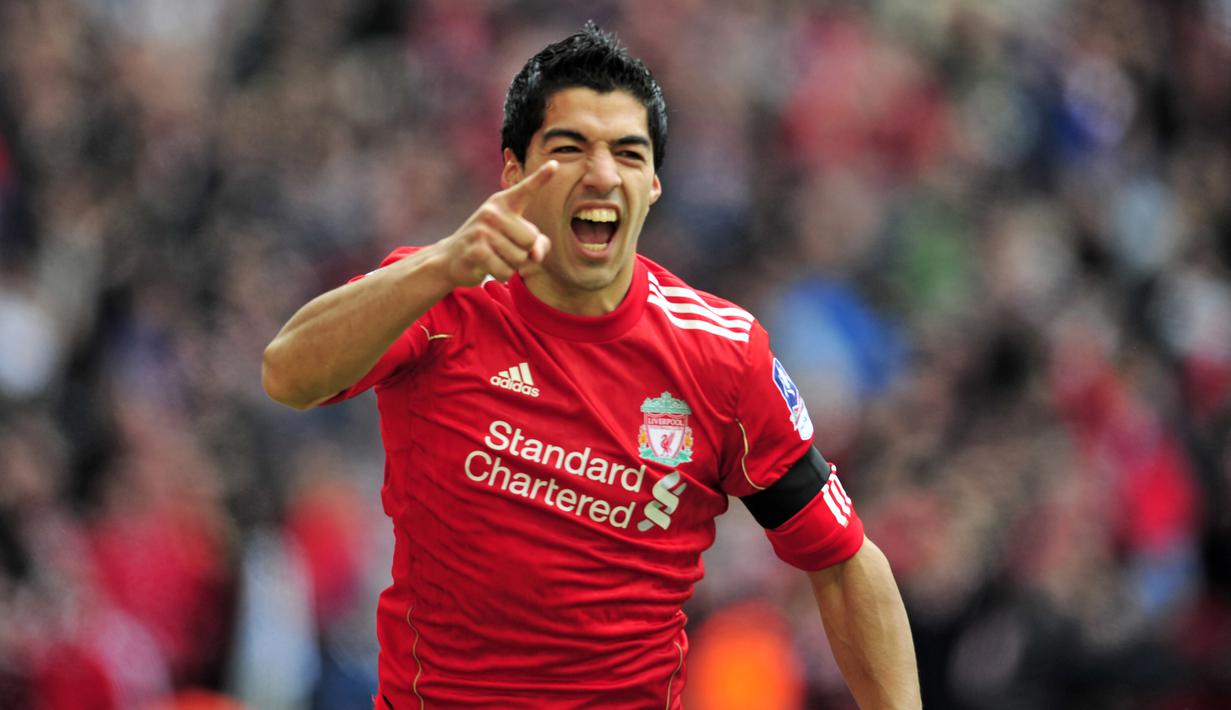 3. Luis Suarez - Suarez berhasil menorehkan quattrick bersama Liverpool di Premier League pada laga kontra Norwich City di Desember 2013. Luis Suarez mencetak empat gol pada menit ke-15, 29', 35', dan 74'. (AFP/Glyn Kirk)