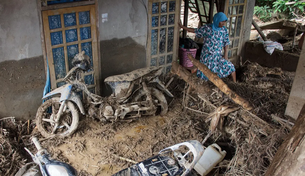 Sedikitnya, 60 rumah terdampak banjir yang terjadi di Nagari Pelangai Gadang, Kecamatan Ranah Pesisir. (REZAN SOLEH/AFP)