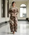 7 Inspirasi Gamis Batik Motif Parang untuk Seragam Organisasi Wanita Resmi, Tampilan Elegan dan Berwibawa (Foto: Gemini AI)