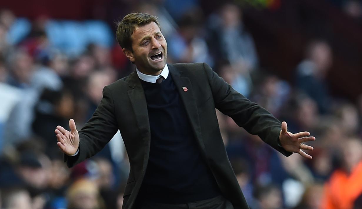 Dari 22 laga tersisa di musim 2013/14, anak asuhan Sherwood hanya kalah enam kali. Namun Tim Sherwood dipecat pada akhir musim dan digantikan oleh pelatih Spurs saat ini, Mauricio Pochetino. (AFP/Paul Ellis)