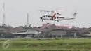 Helikopter milik BNBP saat take off dari Bandara Pondok Cabe di Pamulang, Tangerang Selatan, Senin (22/2). Maret mendatang, maskapai Garuda Indonesia akan membuka penerbangan dari bandara milik PT Pertamina (persero) ini. (Liputan6.com/Immanuel Antonius)