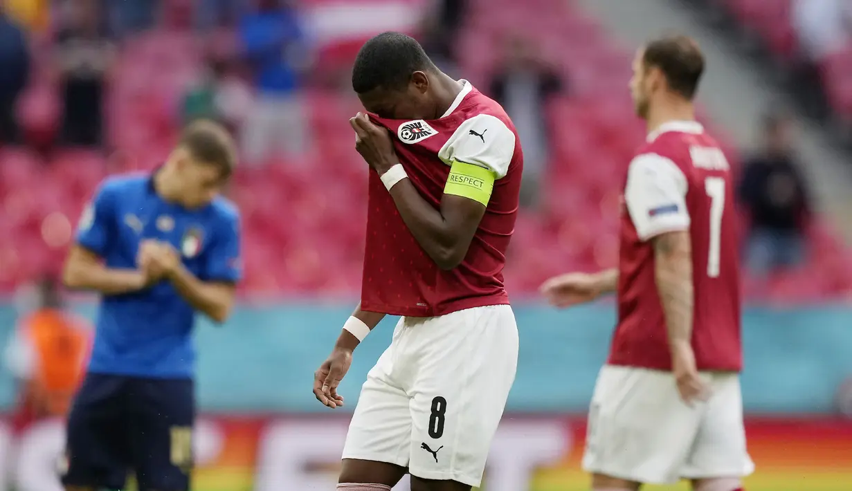 David Alaba - Kapten Timnas Austria ini merupakan salah satu pemain yang bergelimang gelar juara bersama Bayern Munchen. Mulai dari trofi juara domestik, Liga Champions, hingga Piala Dunia Antarklub pernah diraihnya. (AP/Frank Augstein, Pool)