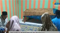 Pasangan Suami Istri Ini Simpan Mayat Sang Anak Hingga 2 Bulan, Ikuti Ajaran Sesat. (Sumber: YouTube/Liputan 6 SCTV)