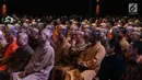 Umat Buddha hadir dalam perayaan Dharmasanti Waisak Nasional 2562 BE/2018 di Tzu Chi Center, Jakarta, Senin (4/6). Acara bertema "Bersatu, Berbagi, dengan Cinta Kasih Membangun Bangsa'. (Liputan6.com/JohanTallo)