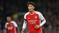 Arsenal kabarnya memasukkan nama Takehiro Tomiyasu ke daftar pinjaman klub pada bursa transfer musim dingin Januari 2024. (AFP/Paul Ellis)