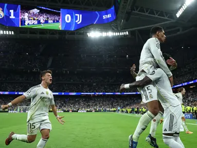 Gelandang tengah Real Madrid asal Inggris, Jude Bellingham merayakan golnya pada matchday 3 Liga Champions 2025/2026 di Stadion Santiago Bernabeu, Madrid, Spanyol, Rabu (22/10/2025) waktu setempat atau Kamis (23/10/2025) dini hari WIB. (Thomas COEX/AFP)