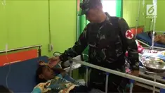 Satgas Kesehatan TNI dikirim ke 8 distrik di Kabupaten Asmat, Papua. Satgas mendatangi rumah warga yang terkena wabah campak, difteri dan gizi buruk.
