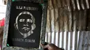 Gambar Presiden AS, Barack Obama di sebuah alat sablon, Kibera, Kenya, Kamis (23/7/2015). Pembuatan kaos bergambar Barack Obama sebagai sambutan kepada Obama yang akan melakukan kunjungan kenegaraan ke Kenya pada Jumat (24/7). (REUTERS/Noor Khamis)