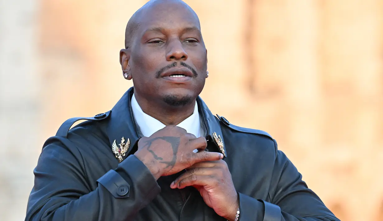 Aktor AS Tyrese Gibson tiba untuk pemutaran perdana film "Fast X", film kesepuluh dalam Fast & Furious Saga, di monumen Colosseum di Roma pada 12 Mei 2023. (AFP/Alberto Pizzoli)