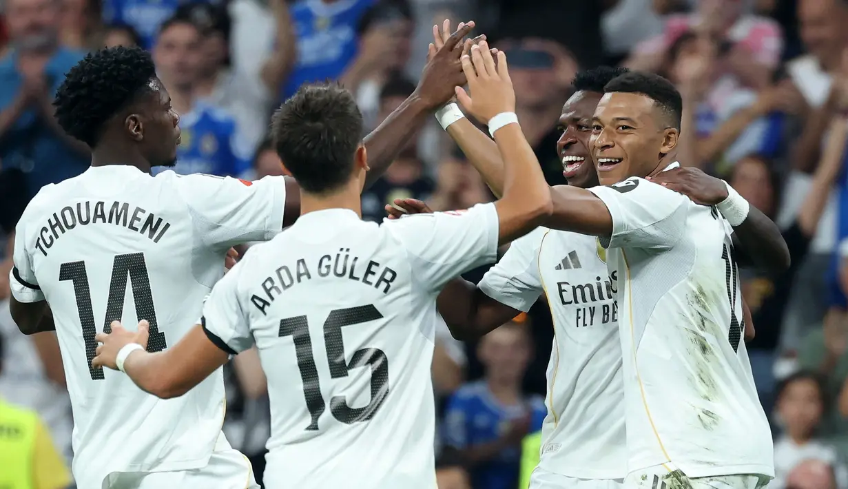 Situasi tersebut memantik spekulasi mengenai masa depan Vinicius Jr dengan Real Madrid. Bahkan dua agennya itu memilih menunggu perkembangan selama musim 2025/2026, sebelum menentukan kelanjutan karier Vinicius. (AFP/Thomas Coex)