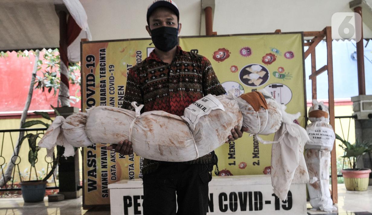 FOTO: Cara Unik Sadarkan Masyarakat akan Bahaya COVID-19 ...