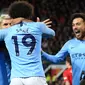 Penyerang Manchester City, Leroy Sane (kedua kanan) , berselebrasi setelah mencetak gol ke gawang Manchester United dalam laga lanjutan Liga Inggris di Stadion Old Trafford, Rabu (24/4). Laga Man United vs Man City berakhir dengan kemenangan 2-0 untuk tim asuhan Josep Guardiola. (AP/Jon Super)