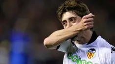 Selebrasi khas winger Valencia Pablo Hernandez seusai menjebol gawang FC Brugge di laga UEFA Europa League di Mestalla Stadium, 25 Februari 2010. AFP PHOTO / JOSE JORDAN 