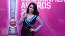 Ussy Sulistiawaty saat menghadiri Infotainment Awards di Studio 6 Emtek City, Daan Mogot, Jakarta, Jumat (22/1/2016). (Liputan6.com/Herman Zakharia)