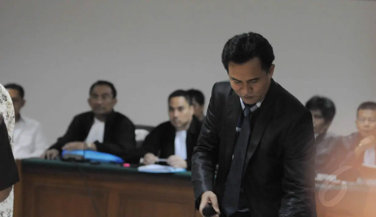 Yusril Izha Mahendra menjadi saksi ahli untuk tersangka kasus Hambalang, Anas Urbaningrum, Jakarta, Rabu (3/9/14). (Liputan6.com/Herman Zakharia)