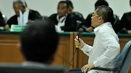 Dalam sidang tersebut, Anas Urbaningrum didakwa telah menerima dua mobil dan uang miliaran rupiah sebagai imbalan atas pengurusan beberapa proyek-proyek pemerintah, Jakarta, Jumat (30/5/14). (Liputan6.com/Johan Tallo)