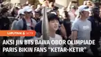Personel boy band BTS Jin membawa obor olimpiade berkeliling Kota Paris. Kehadiran Jin BTS membuat penggemar riuh di sepanjang jalan yang dilalui Jin.