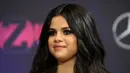 Walau demikian dengan penyakit lupus yang telah dirasakannya, Selena Gomez tetap semangat merangkai tur dunianya di album 'Revival' pada tahun ini. (AFP/Bintang.com)