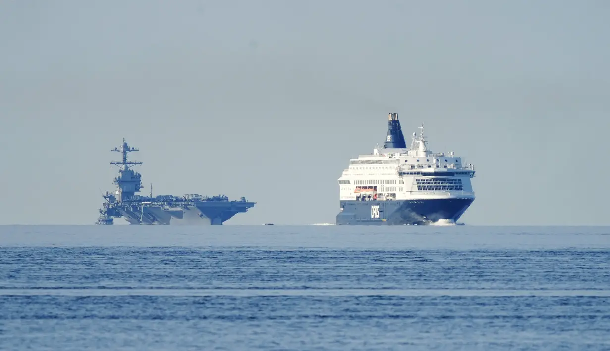 Kapal induk raksasa berukuran 337 meter senilai $12,8 miliar sedang dalam pelayaran operasional pertamanya, dan Oslo akan menjadi pelabuhan pertama yang dikunjungi. (Terje Pedersen/NTB/AFP)