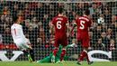 Pemain Sevilla, Joaquin Correa berhasil membobol gawang Liverpool dalam laga Grup E Liga Champions di Stadion Anfield, Rabu (13/9). Sevilla berhasil menahan imbang Liverpool dengan skor 2-2. (AP Photo/Frank Augstein)