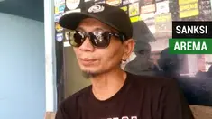 Berita video komentar dirigen Aremania yang kena sanksi seumur hidup tak bisa masuk stadion terkait sanksi yang diberikan kepada Arema FC.