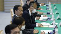 Presiden Jokowi bertemu PM Jepang di Tokyo. ©Kiyoshi Ota/POOL/AFP