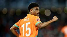 Pemain Pantai Gading, Amad Diallo, melakukan selebrasi setelah mencetak gol ke gawang Burkina Faso pada laga Piala Afrika, Rabu (07/01/2026) dini hari WIB. (AFP/Franck Fife)