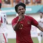 Bek Indonesia, Firza Andika, melakukan selebrasi usai membobol gawang Yordania pada laga persahabatan di Stadion Wibawa Mukti, Jawa Barat,  Sabtu (13/10/2018). (Bola.com/M Iqbal Ichsan)