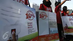 Kementerian ESDM menggelar kampanye hemat energi bertema "Aksi Bersama Menteri ESDM Gerakan Potong 10%" di Bundaran HI, Jakarta, Minggu (15/5). Kampanye dilakukan dengan jalan santai di sepanjang kawasan Car Free Day. (Liputan6.com/Faizal Fanani)