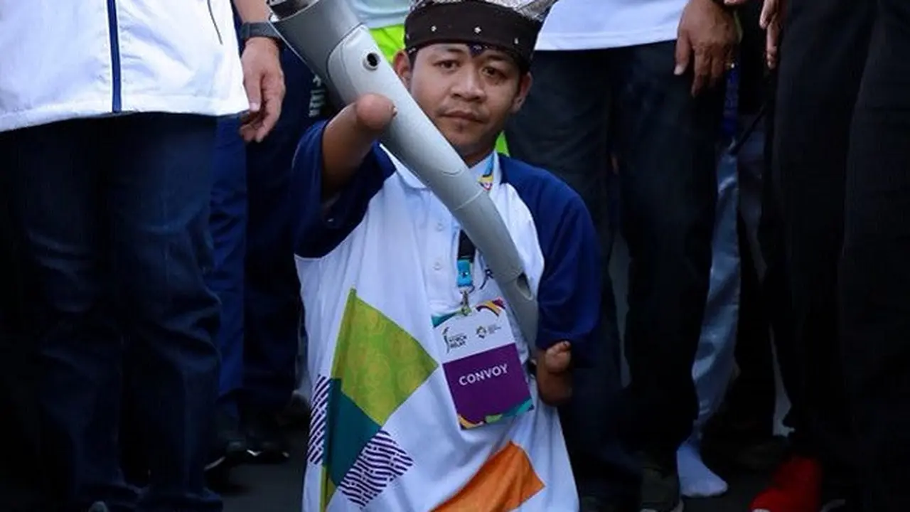 Mengenal Zulkarnain, Fotografer Difabel Pembawa Obor Asian Games di Banyuwangi