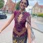 Puteri Indonesia Pariwisata 2022 Adinda Cresheilla berpose di jalan dalam ajang Miss Supranational 2022. (dok. Instagram @officialputeriindonesia/https://www.instagram.com/p/CfxqK3fFQmr/Dinny Mutiah)
