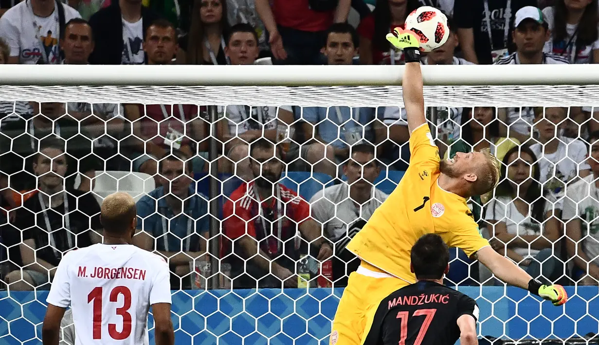 2. Kasper Schmeichel (Denmark) - 21 kali penyelamatan. (AFP/Jewel Samad)